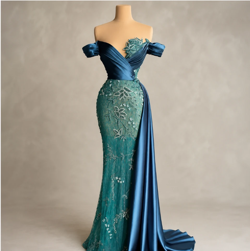 Emerald lace gown with satin drape on the dress form at Salimar Fashion and Tailor, Columbus